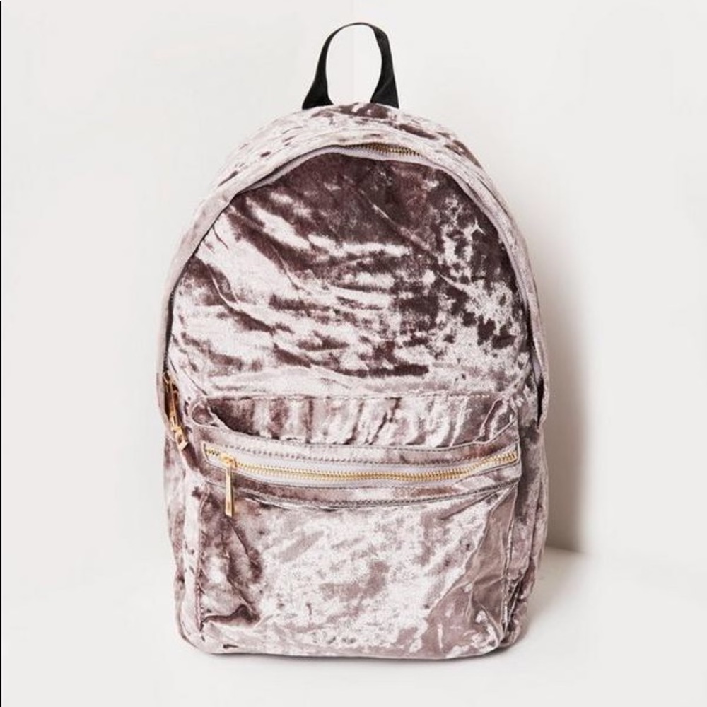 Grey crushed velvet misguided mini backpack.